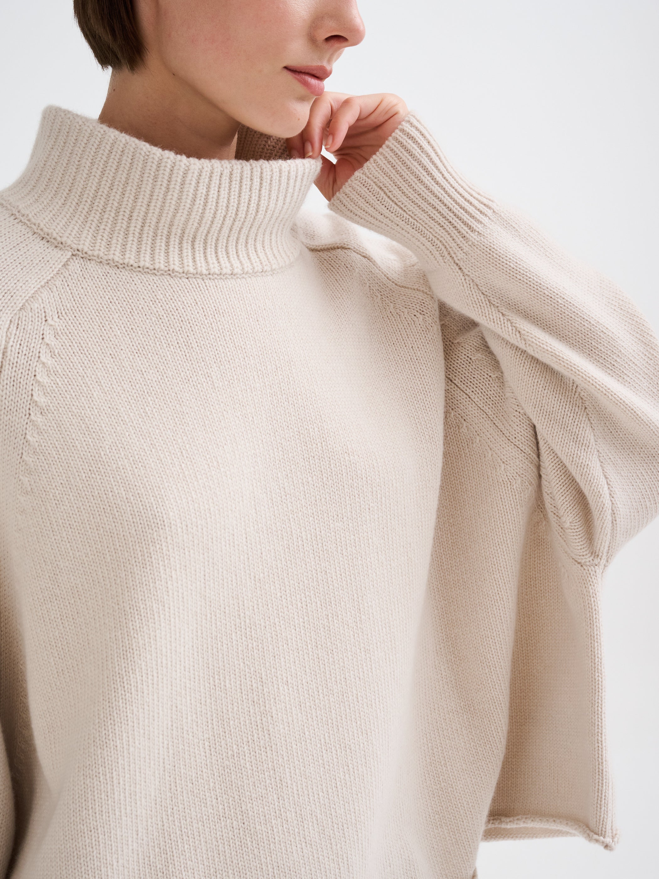 Oversized merino wool funnel-neck sweater