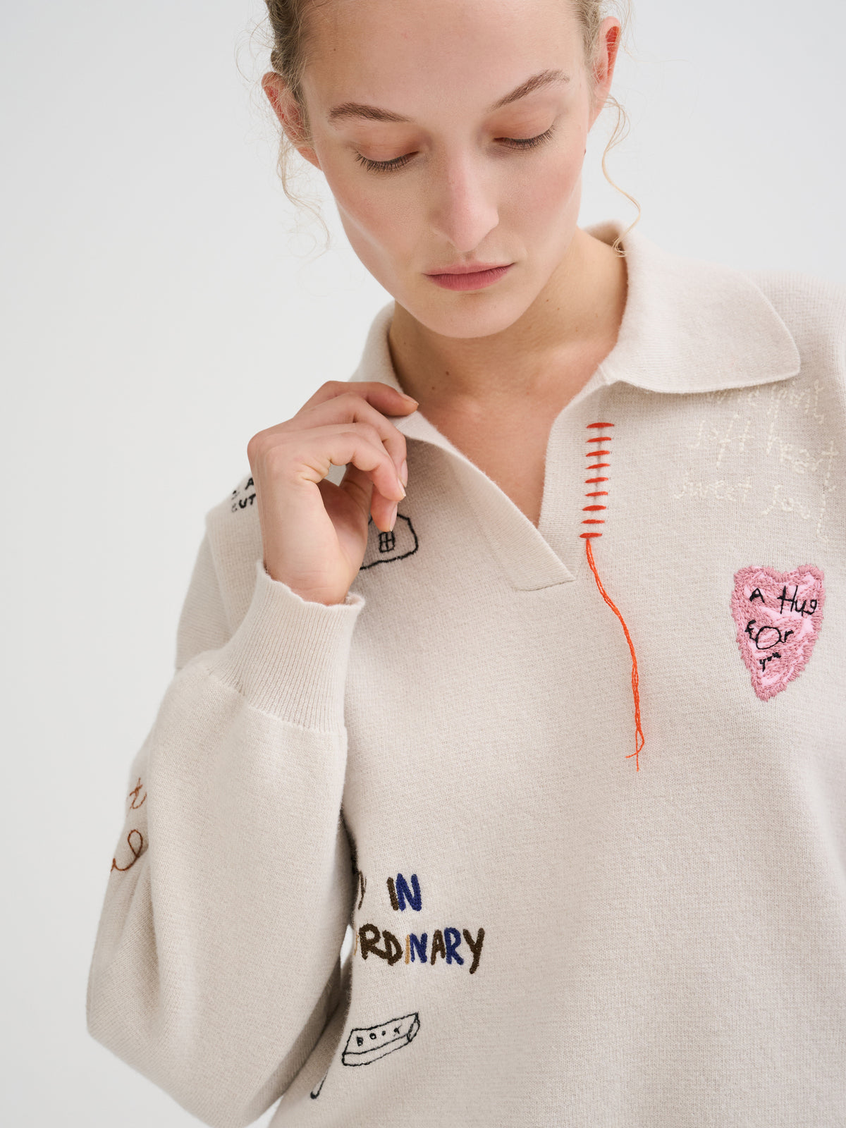 Embroidered merino wool polo