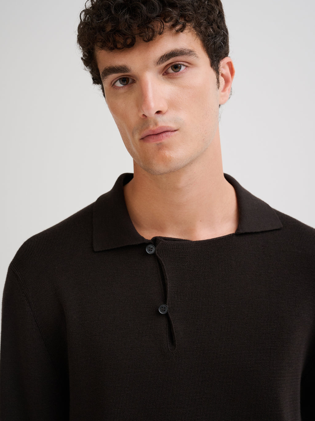 Merino wool polo with asymmetric collar