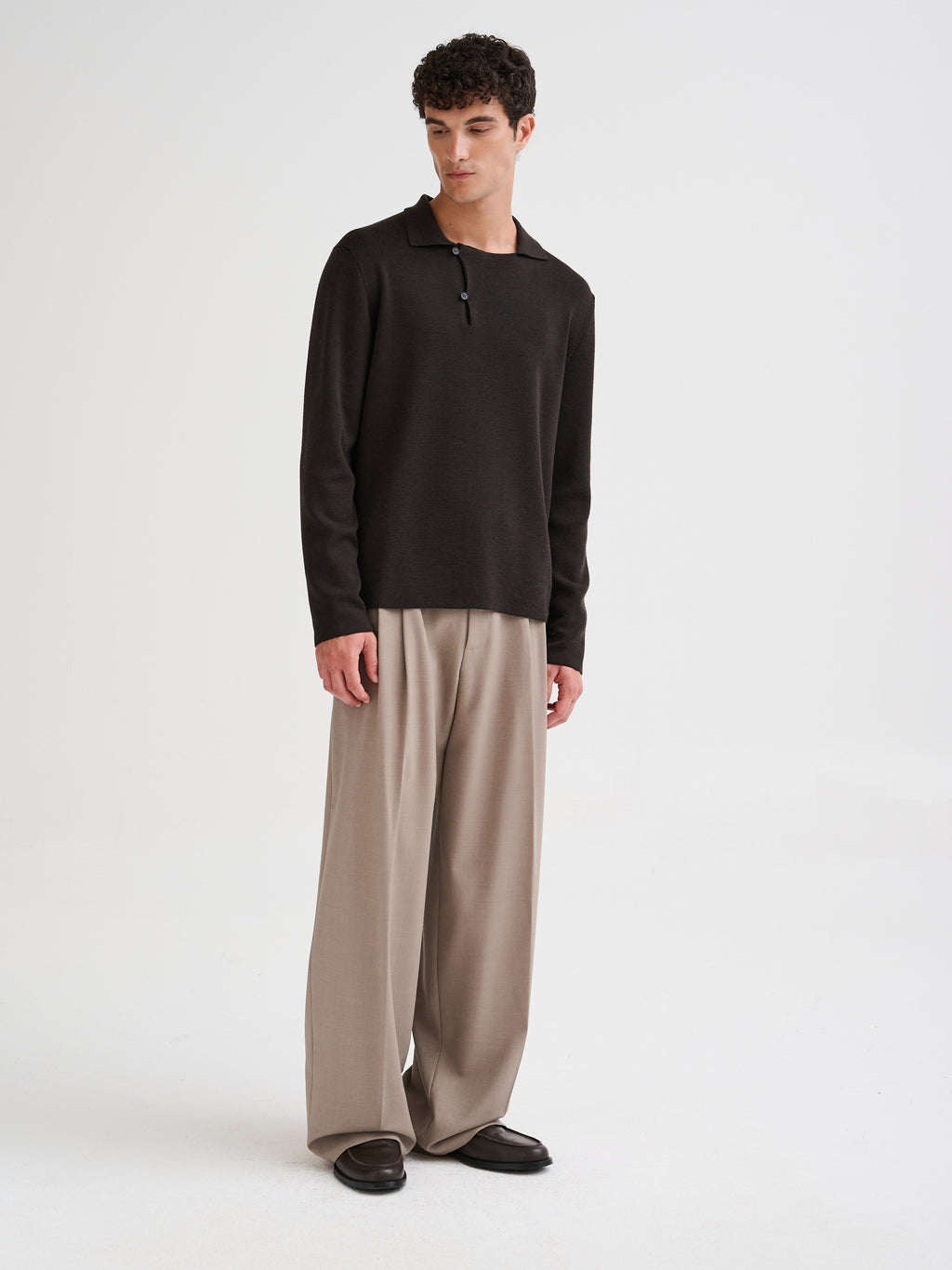 Merino wool polo with asymmetric collar
