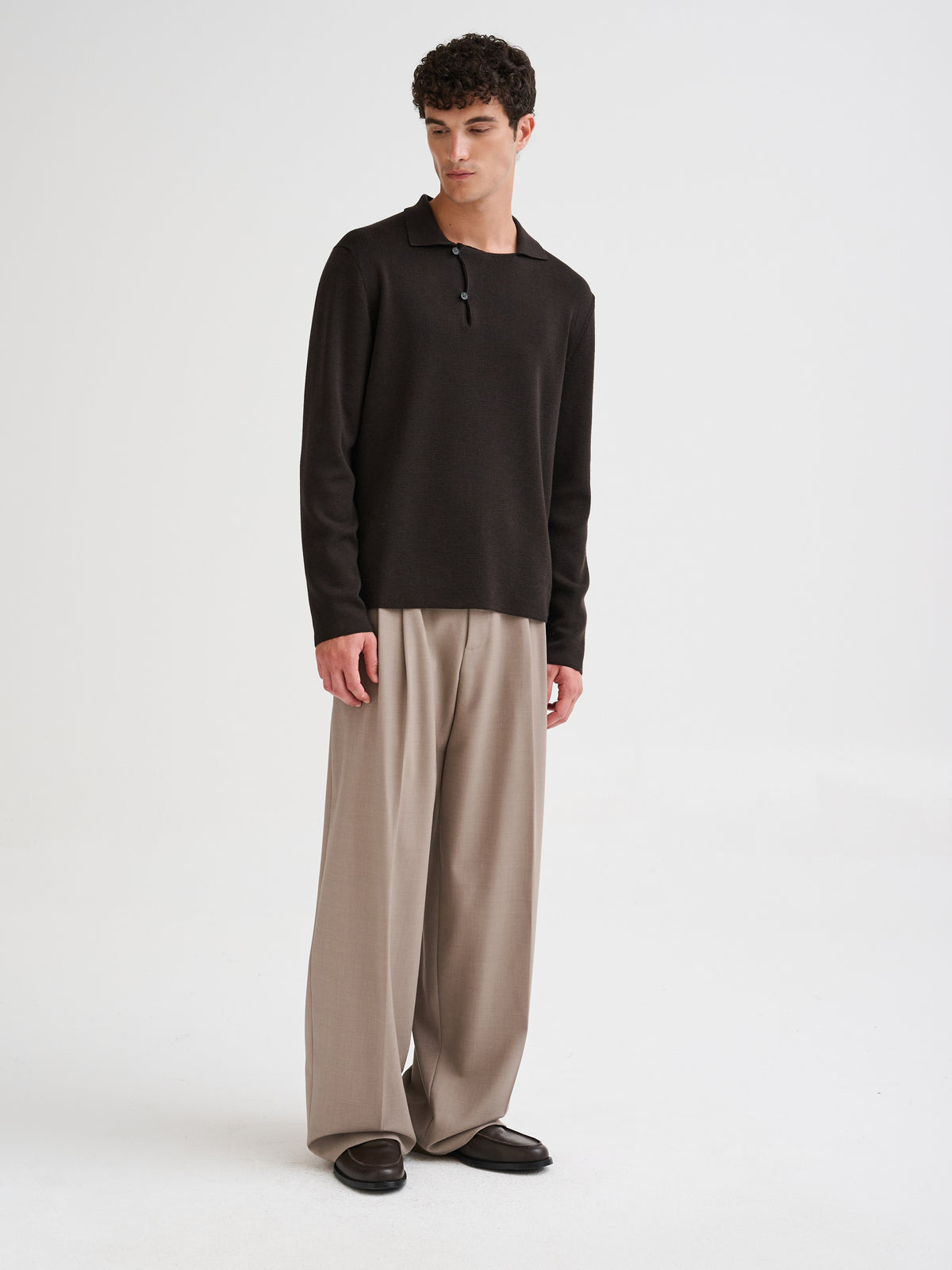 Merino wool polo with asymmetric collar