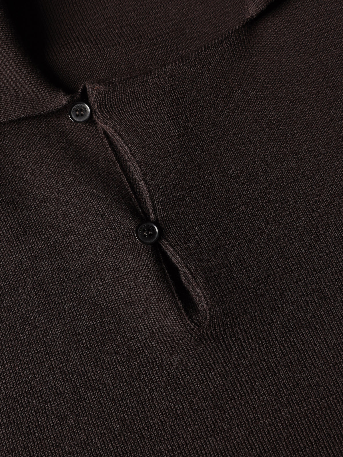 Merino wool polo with asymmetric collar