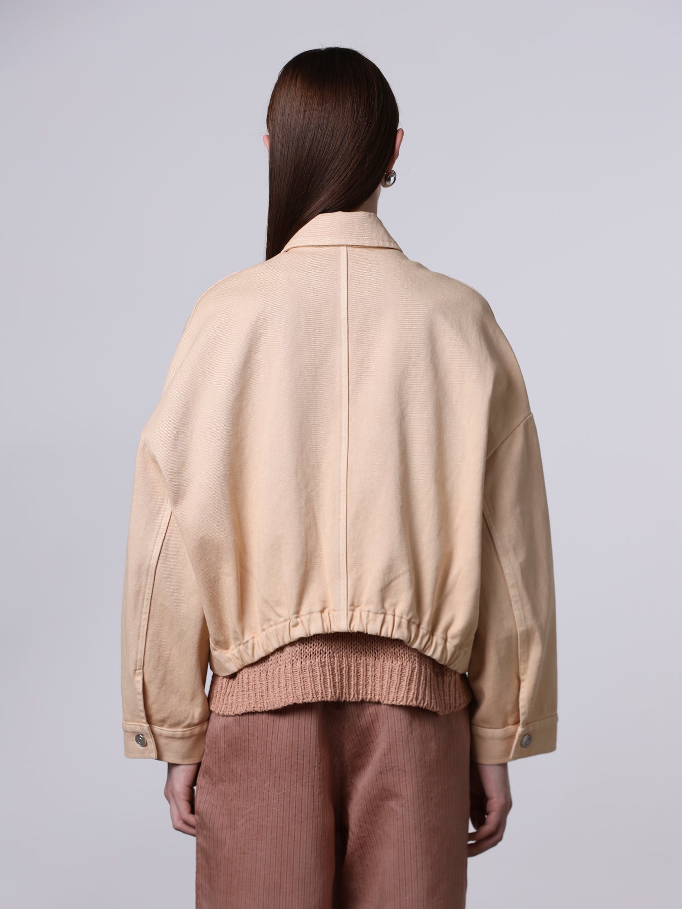 Jacket with gathered hem