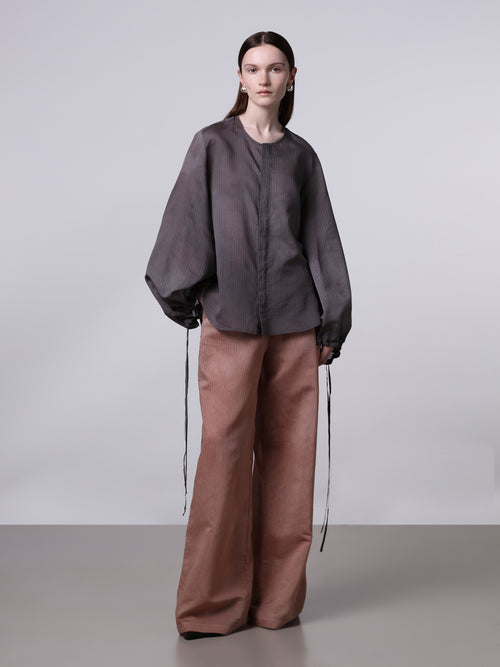 Oversized shirt with drawstrings sleeves